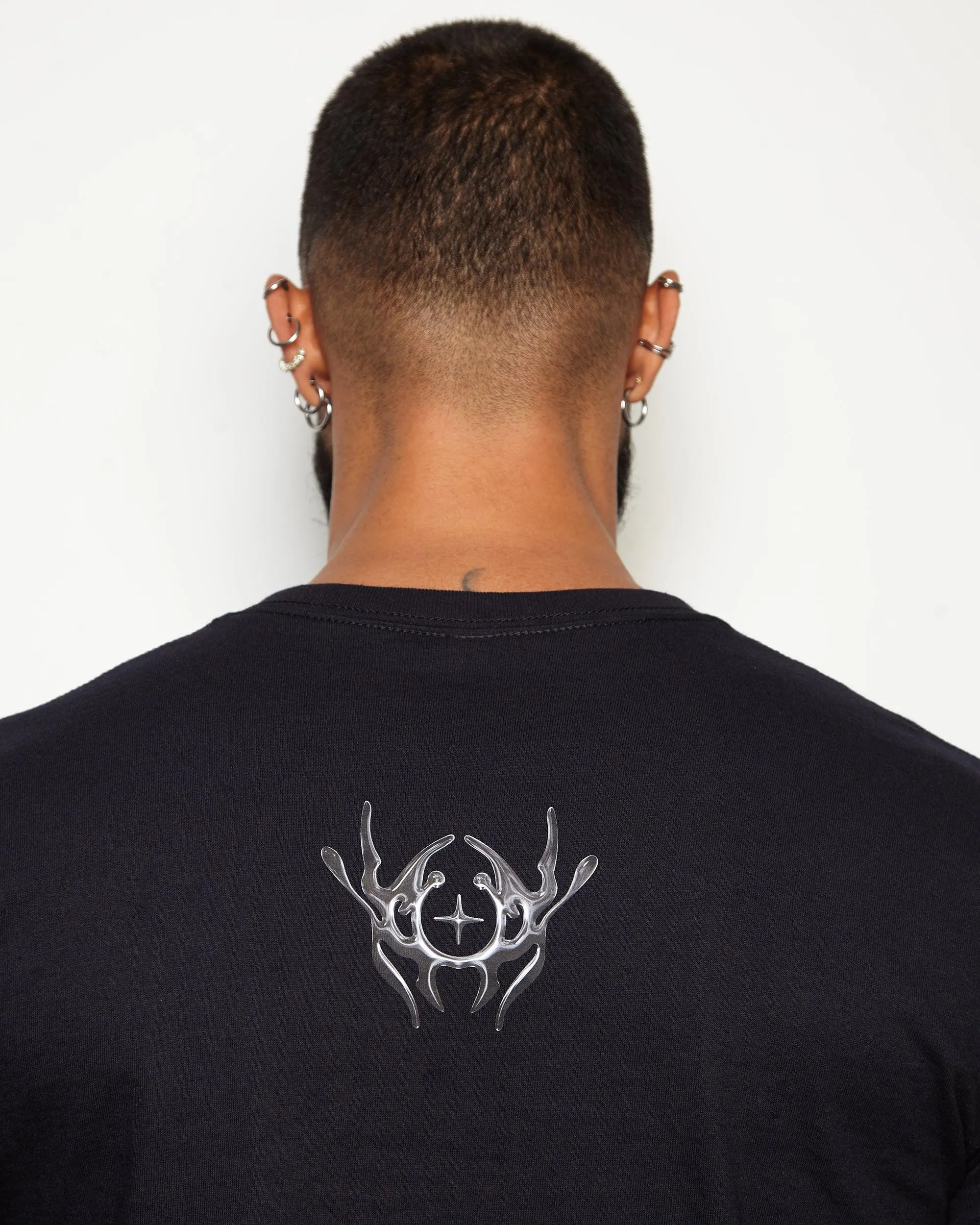 NXS003: Gunmetal style print on black tee