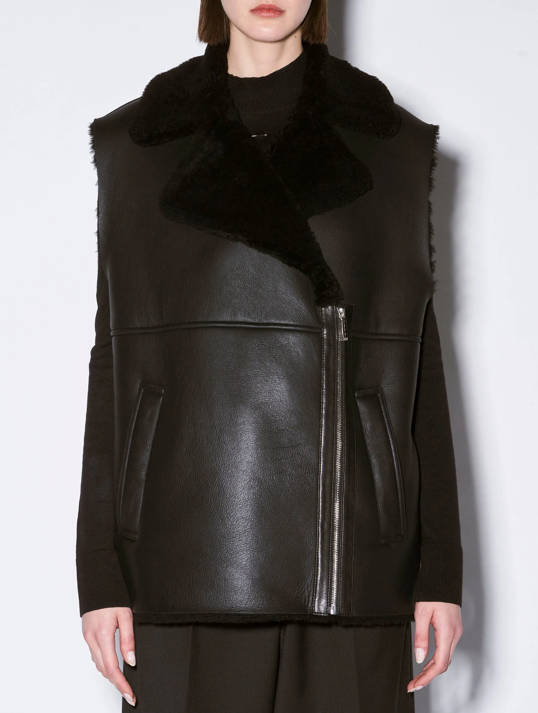 Sleeveless black shearling jacket